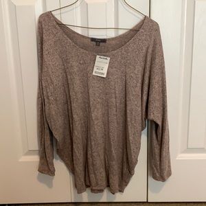 Pink top with quarter length sleeves